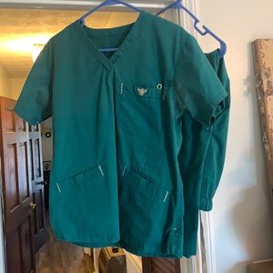 Women’s med couture hunter green with tan scrub set. Size small top XS pants